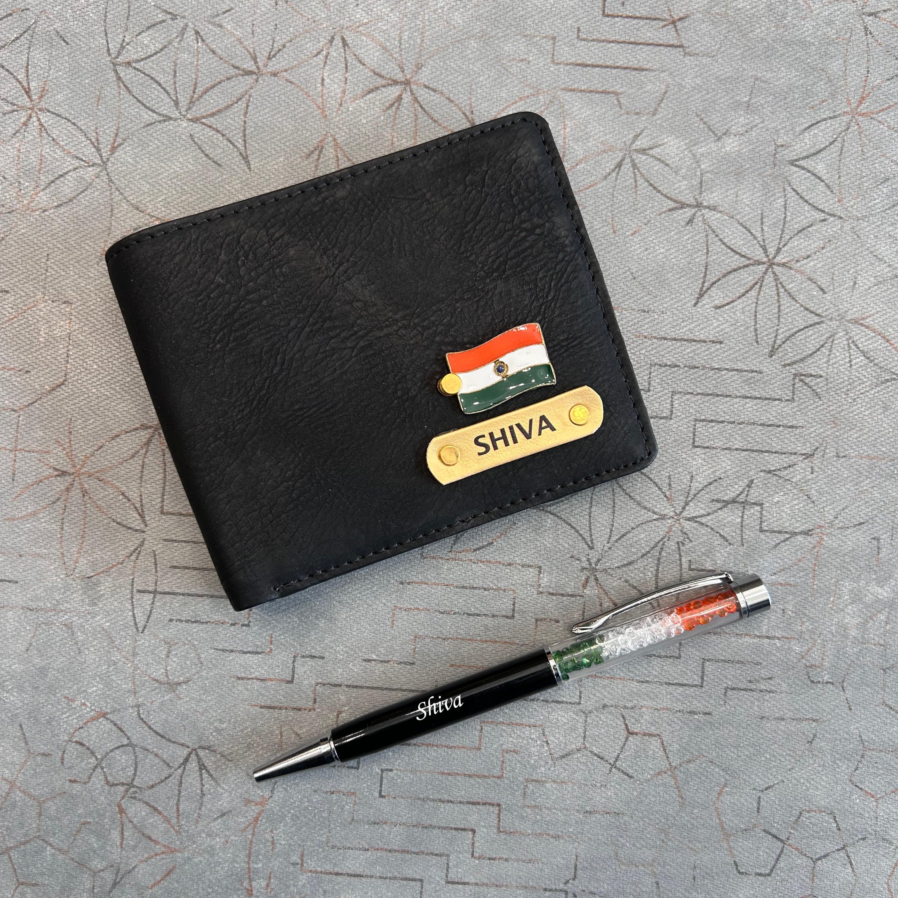 Brown leather wallet with nameplate and pen on a textured surface in India theme - The Gifting Era 