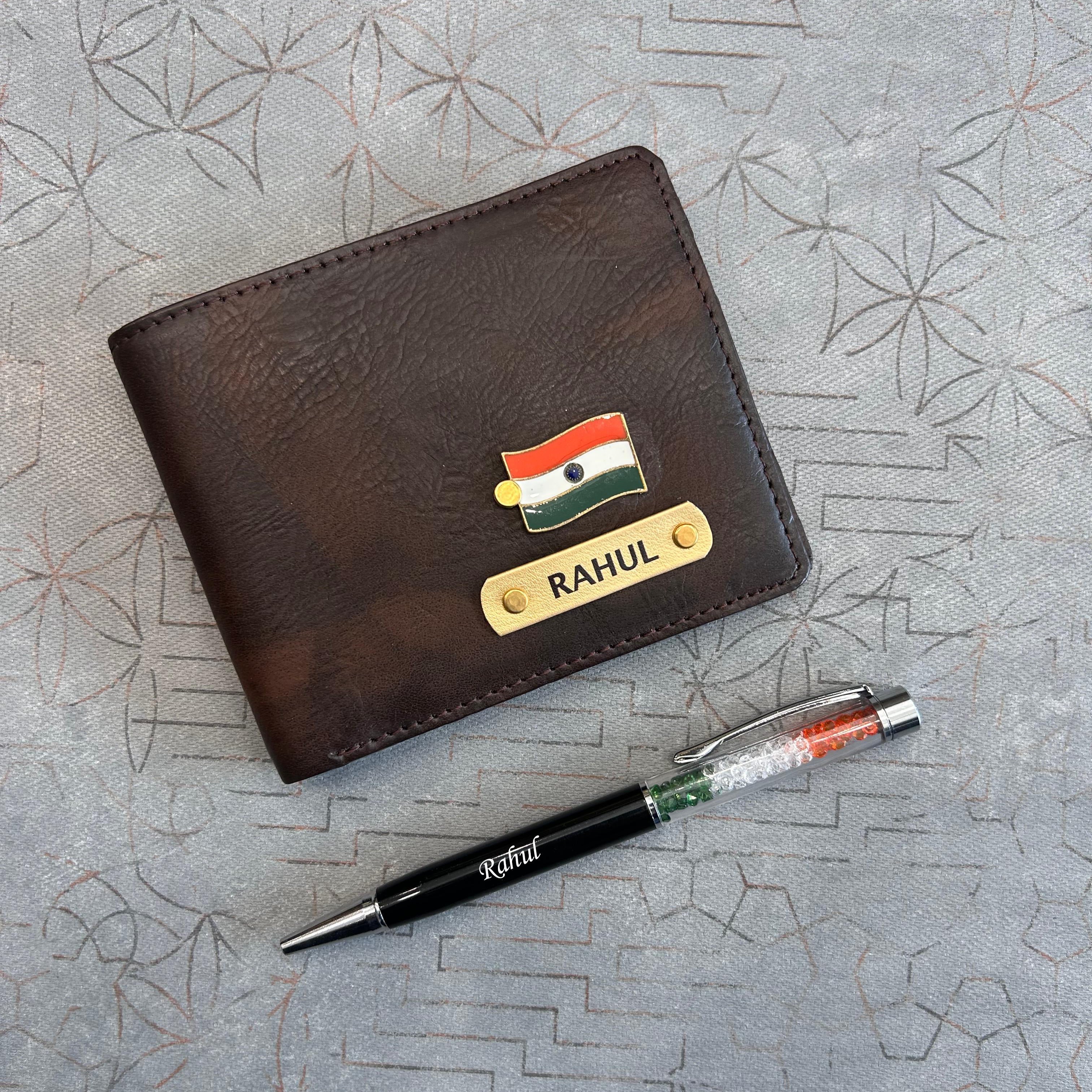 Brown leather wallet with nameplate and pen on a textured surface in India theme - The Gifting Era 